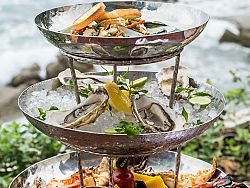 Andaman Platter (for 2 guests) Sea shrimps, tiger prawns, rock lobster, Fine de Claire oysters, steamed Rawai clams in chili, ginger, garlic, coriander and coconut milk