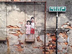 Step by Step Lane’s ‘Children on Swing’ street art is a major highlight on Penang’s street art map.
