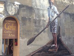 Street art mural of a gondolier