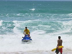 Local lifeguards paroling the sea during southwest monsoon season.