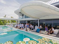 Industry representatives engaged infl uential editors from over a dozen luxurylifestyle media during the private champagne breakfast in a Kata Rocks Sky VillaPenthouse