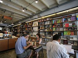 Bookhemian 2521 is a cool coffee shop with creative drinks and a collection of books and independent movies