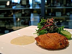 Smoked haddock and salmon fish cake in mustard sauce 