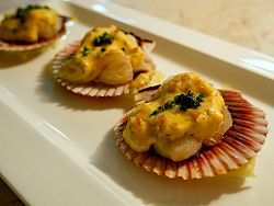 Half shell scallop pomelo citrus hollandaise