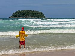 A lifeguard on Kata Beach keeps a close eye on the waves.