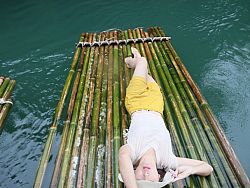 Relaxing on a bamboo raft