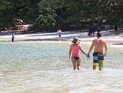 Day trippers along a beach in the Surin Islands