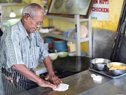 The art of making roti has been perfected by Abdul, and his roti restaurant is a favourite in Phuket Old Town