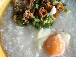 Rice porridge and mee sua soup are typical breakfast dishes in Phuket. Both are tasty and filling as well as exremely affordable