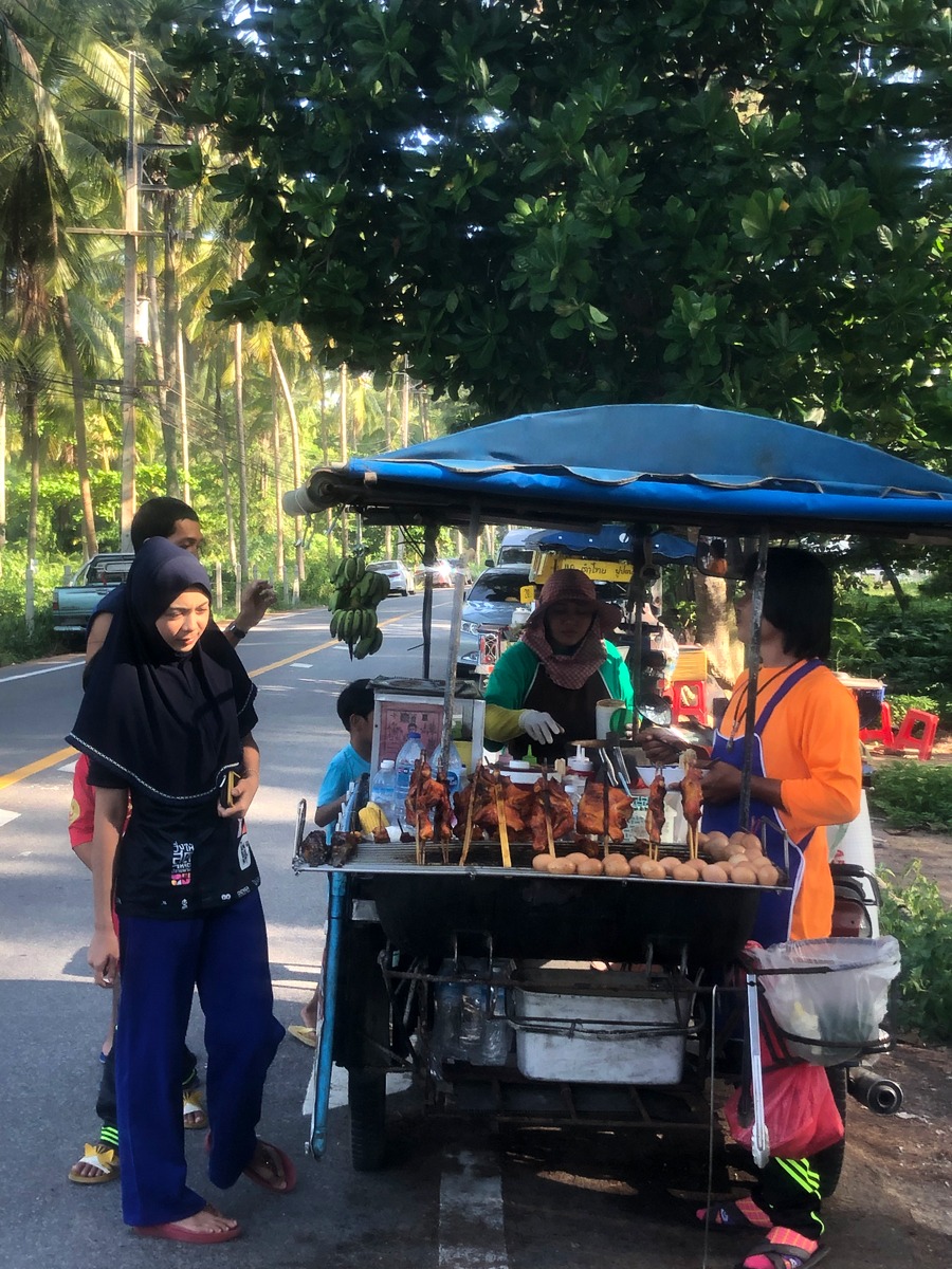 Plenty of local vendors line the roads of Sirinat National Park. Make sure to enjoy some local Thai food while hanging out at the beach!